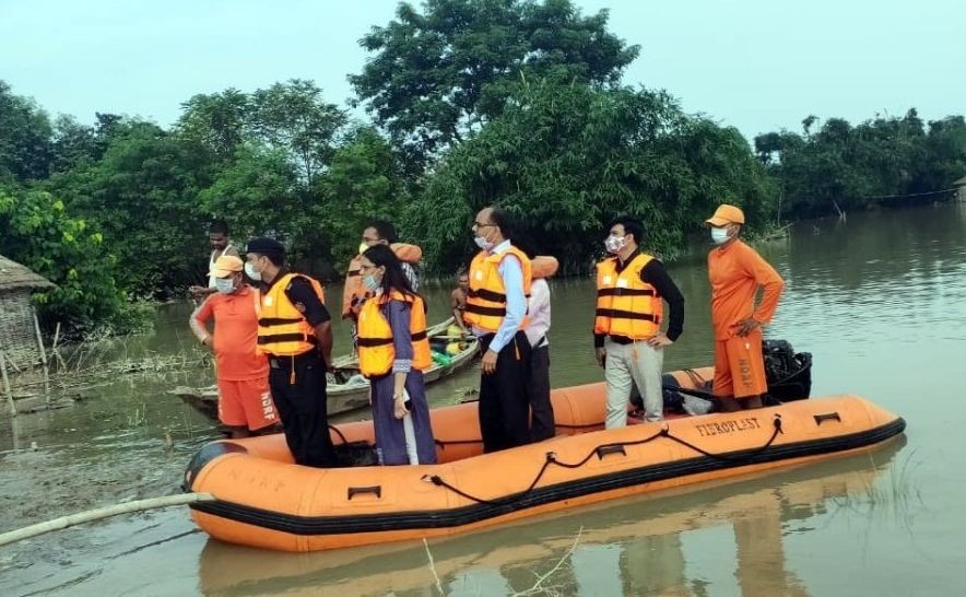 Muzaffarpur: A team of the National Disaster Response Force (NDRF) evacuate people in the flood-hit Muzaffarpur district of Bihar on July 27, 2020. (Photo: IANS)